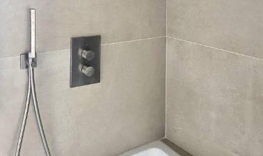 Medida de la adherencia de los adhesivos para colocación de baldosas cerámicas