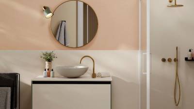 $!Neolith Crème en pared, ducha y revestimiento de mueble.