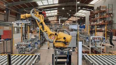 Robot paletizador de altas producciones.